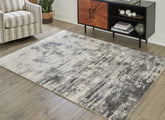 Bay Furniture Gallery - Ashley Furniture - Gerdie Rug - 5'3" x 7'3" Rug / Cream/Gray - R404992